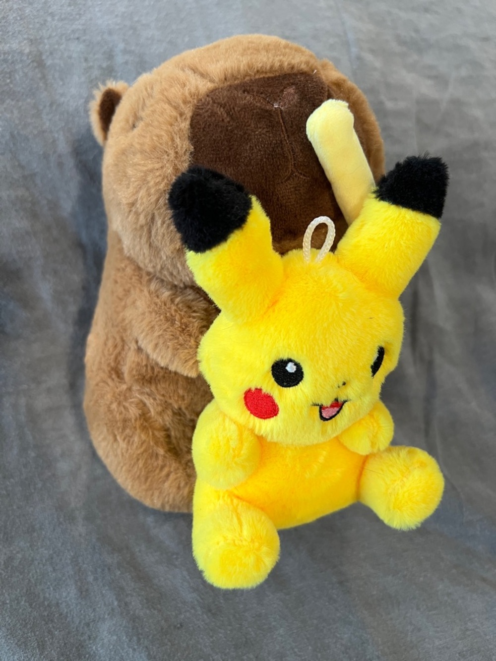Soft Brown Capybara Plush Hugging a Yellow Pikachu Pokemon Anime Plush